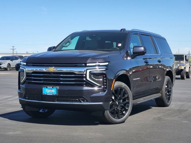 2026 Chevrolet Suburban LT in Dark Ash Metallic — front three-quarter view